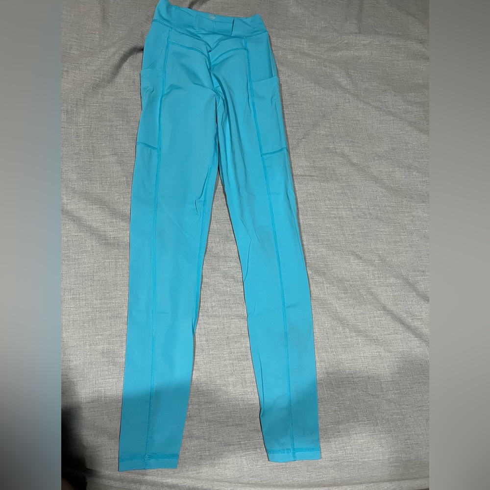 Blue 1St Phorm leggings with Pockets. In great condition